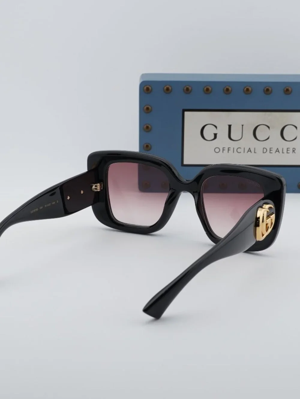 Gucci GG1975S 001 Square Sunglasses – Black / Red Gradient